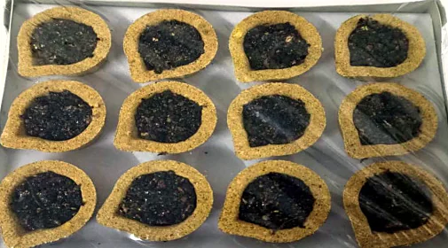 Tray of Shree Aroma Dashang dhoop cups in a traditional leaf shape